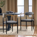 Chaises de salle à manger en fer rembourrées de tissu